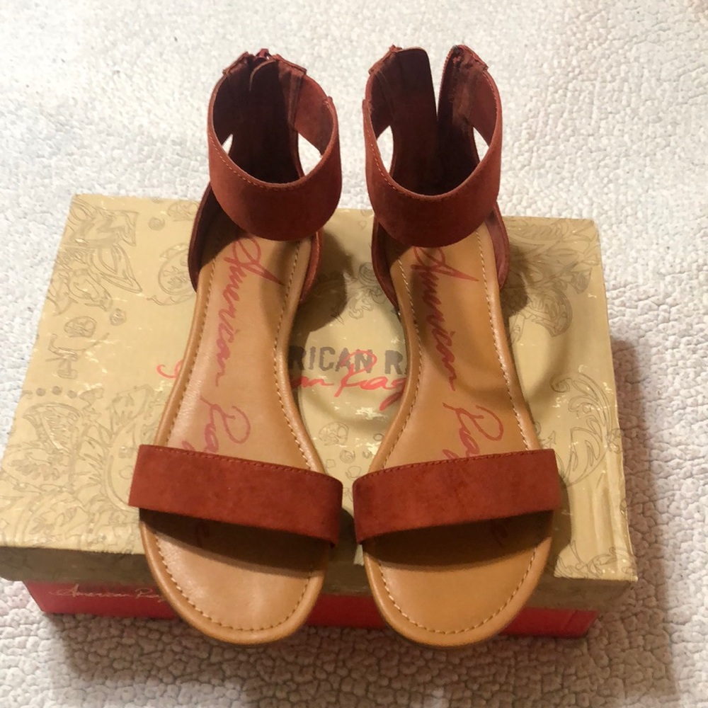 Brand new sandals with zipper in back